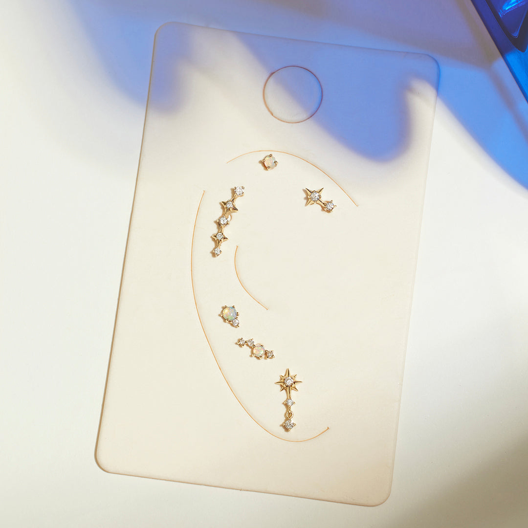 Collection of 14k YG Star Jewelry. Threadless tops featuring diamonds and Opals.  