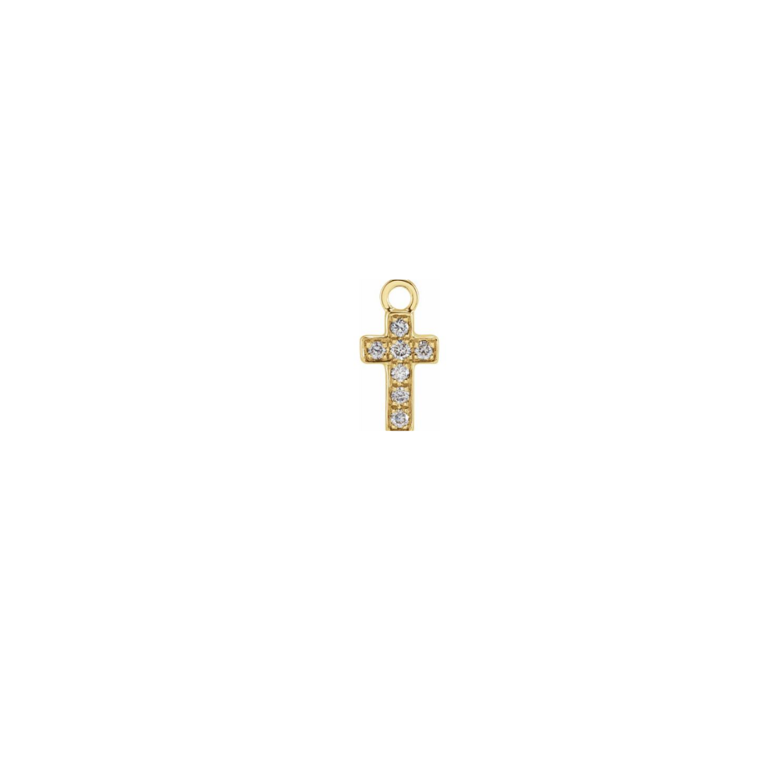 Petite 14k yellow gold diamond cross charm on a white background