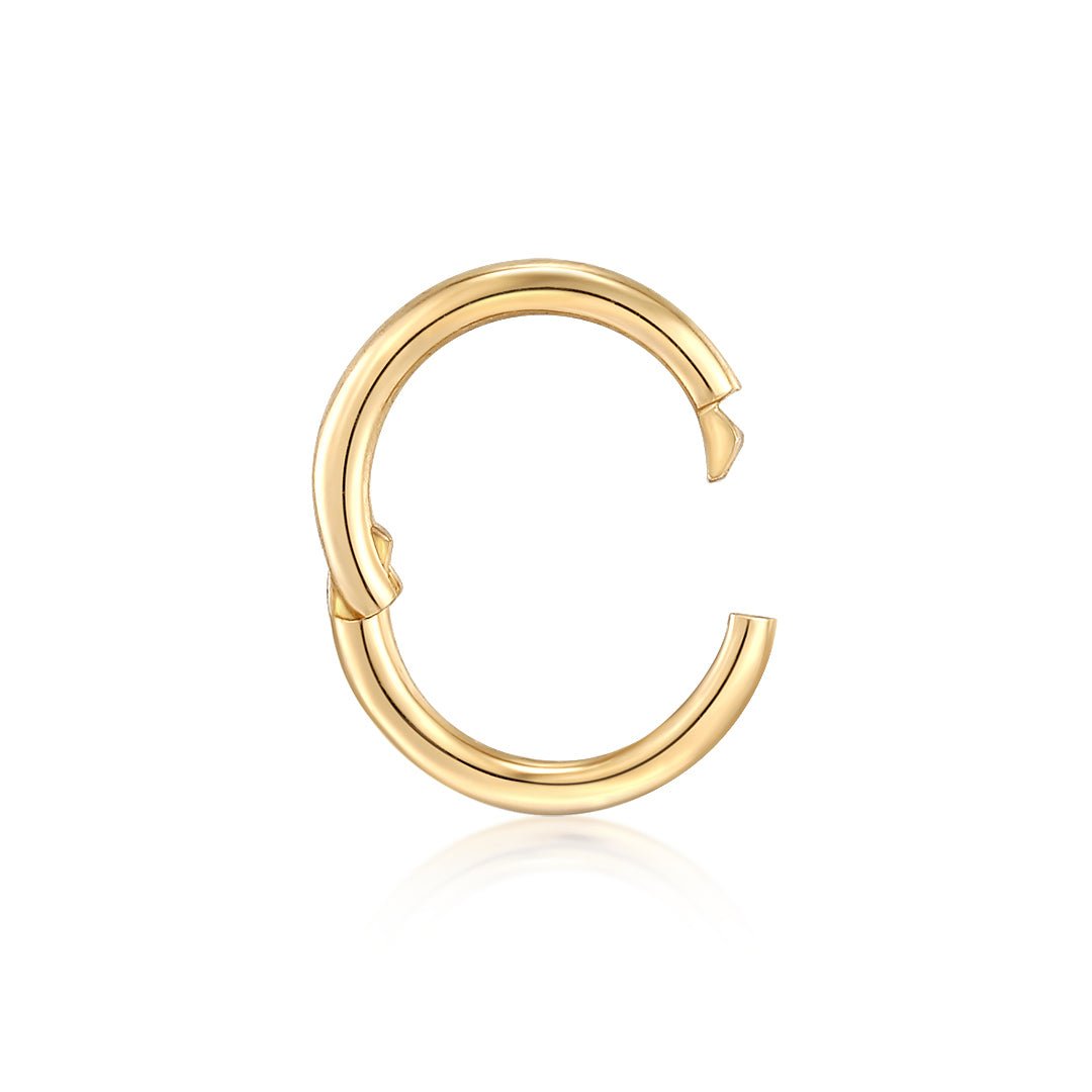 14k yg hinged charm bail connector shown open, as if you were going to connect it to a chain, or to add charms. 